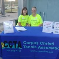 Volunteers at a CCTA table